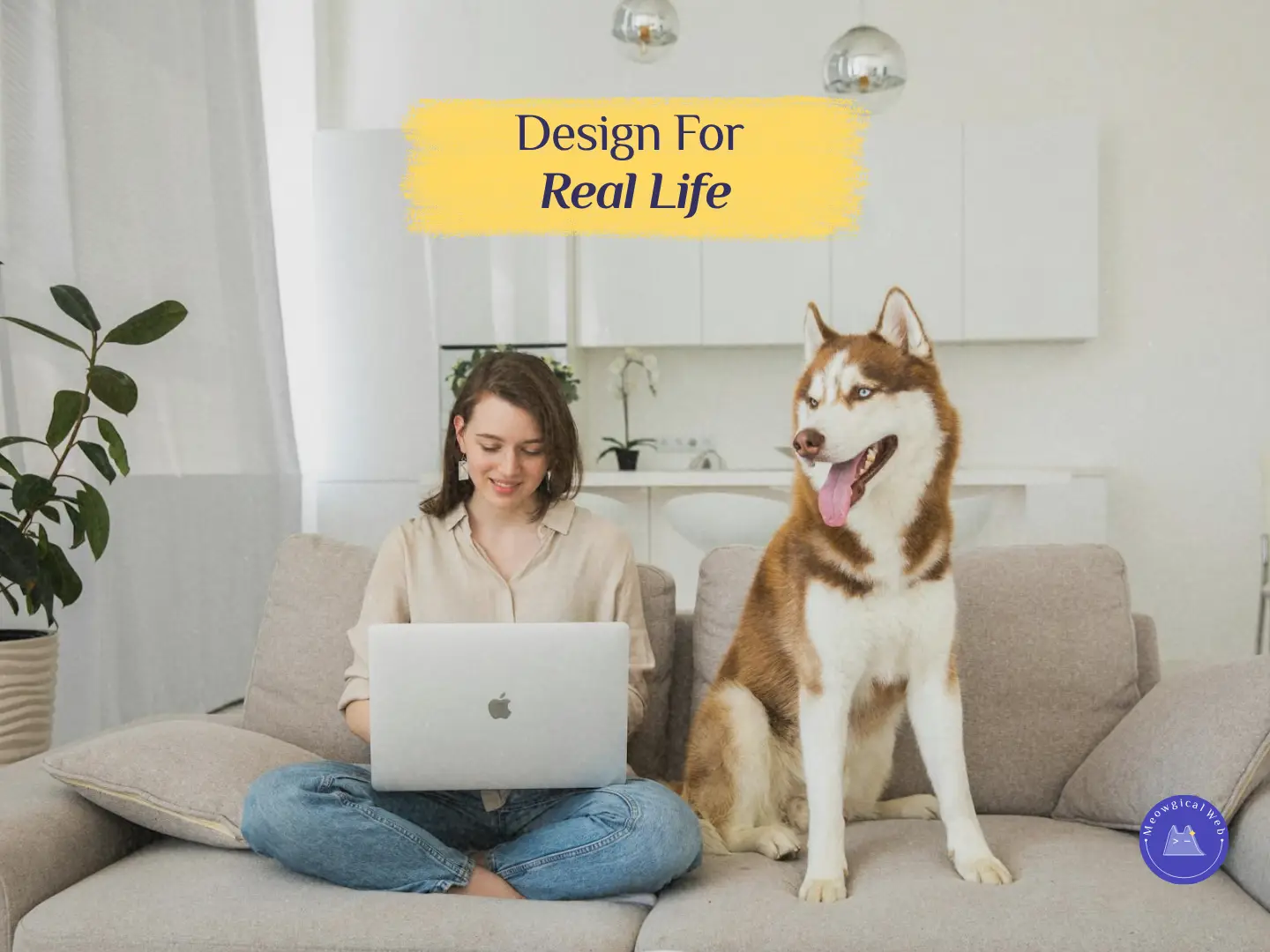 Woman working on a laptop beside a relaxed husky, showing how calm website design supports real life browsing moments.